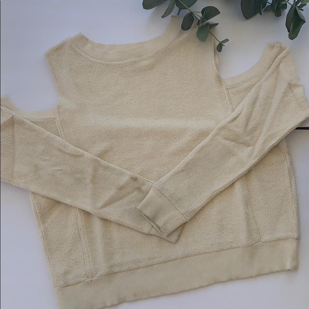Woman’s Cold Shoulder Sweater